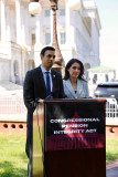 Reps. Subramanyam and Luna standing at a podium in front of the U.S. Capitol