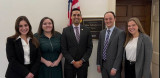 Rep. Subramanyam standing with his staff